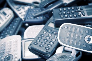scatered old cell phones