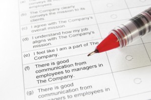 closeup of a blank employment survey with red pen
