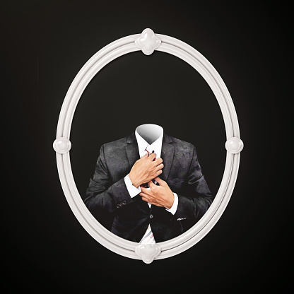 Invisible Man In Black Suit In White Oval Picture Frame Picture Id612626828