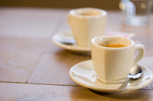 Two Espresso Cups On A Wooden Table Picture Id73873901