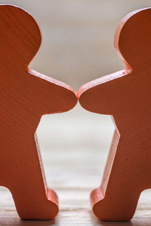 Wooden Figures Hand In Hand Trust