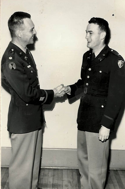Tom making 1st lieutenant in the Army.