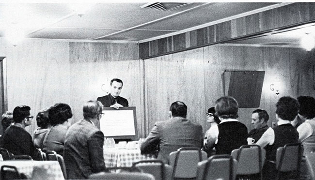 Leading a focus group in the 1960s.