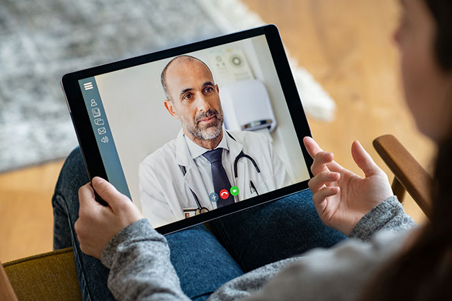 Doctor on zoom screen with patient