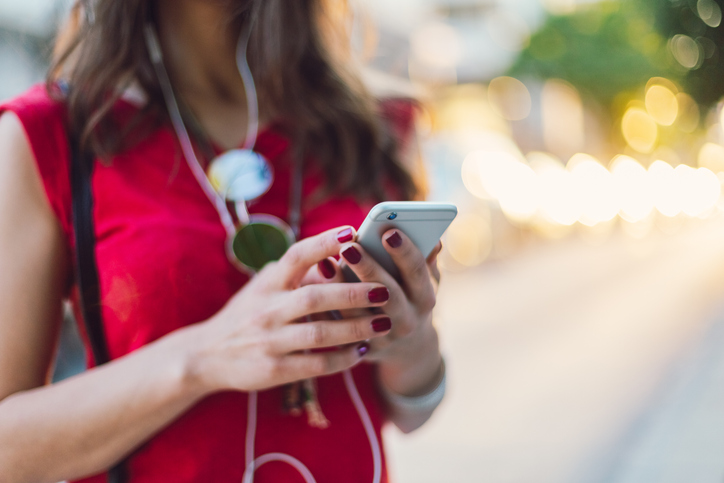 Close Up Of Texting Woman