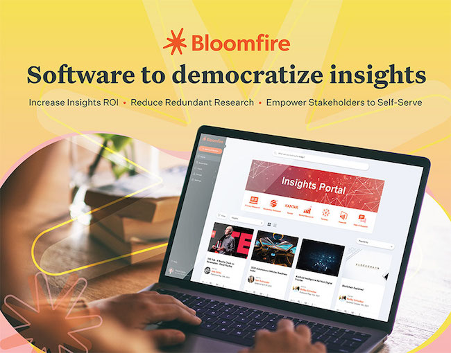 Bloomfire website shown on a laptop.
