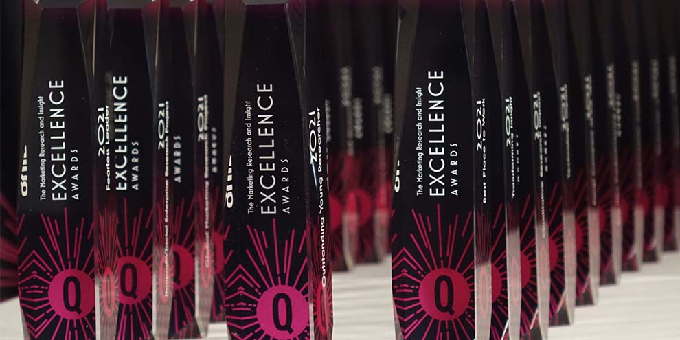 Three Rows Awards Black Background On White Table