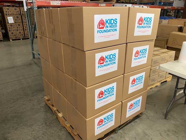 Stack Of Boxed Full Of Stupplies With Kinf Sticker