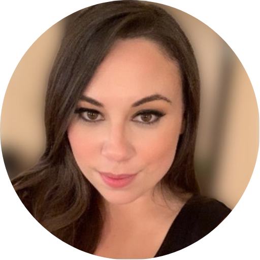 Lindsey Guzman’s headshot on a blurred background.