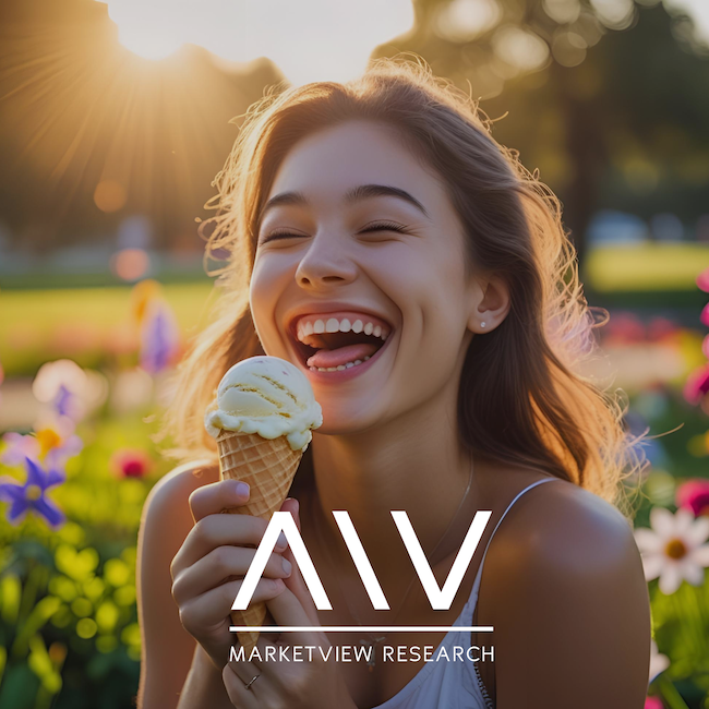 A woman eating ice cream in a field of flowers.