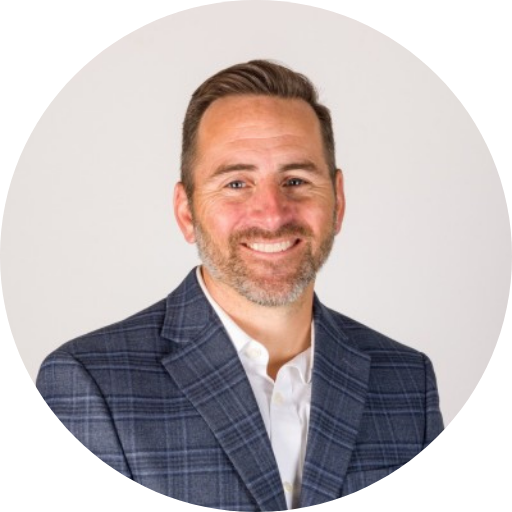 Chris Hoyle’s circular headshot on a plain white background.