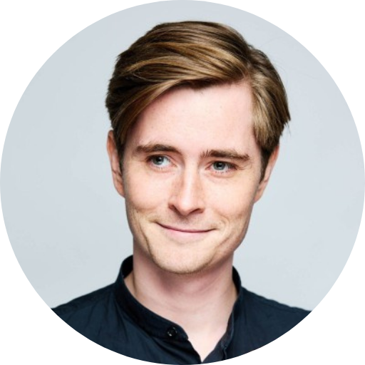 Alfred Wahlforss’ headshot on a plain, pale blue background.