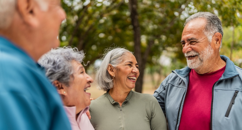 Older adults talking and laughing