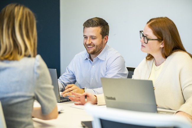 People discussing at a table